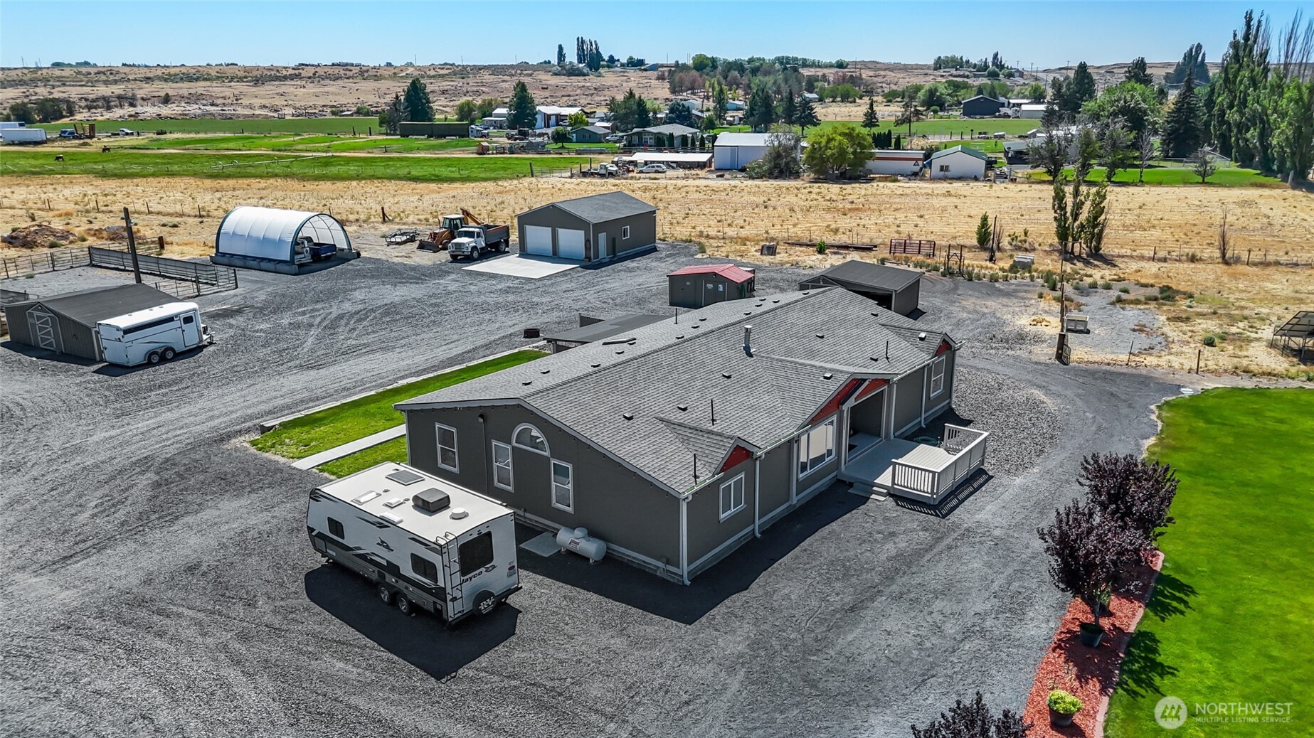12455 Dodson Road Northwest Ephrata, WA 98823 - Photo 34 of 40 a wooden bench sitting in the middle of a park