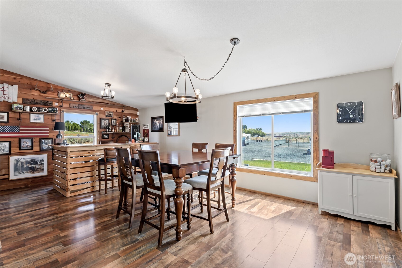 12455 Dodson Road Northwest Ephrata, WA 98823 - Photo 6 of 40 a view of a dining room with furniture and wooden floor