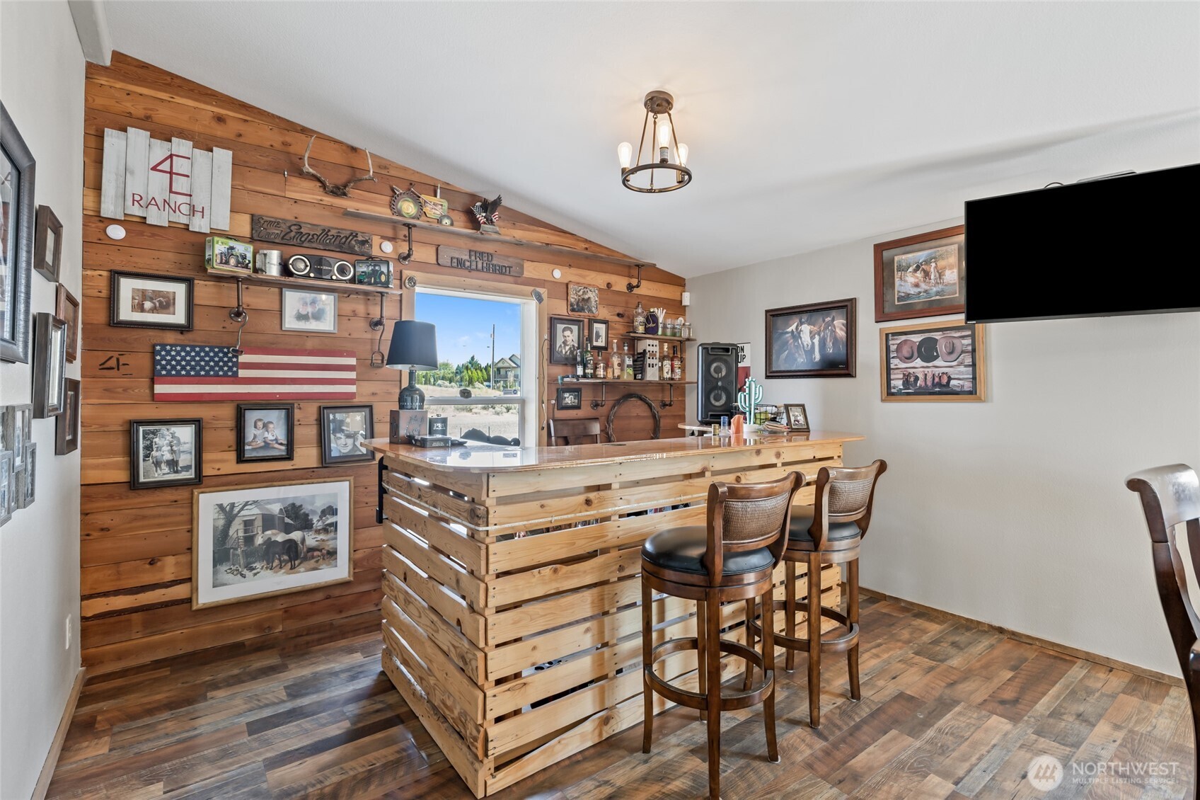 12455 Dodson Road Northwest Ephrata, WA 98823 - Photo 7 of 40 a kitchen with stainless steel appliances a dining table and chairs