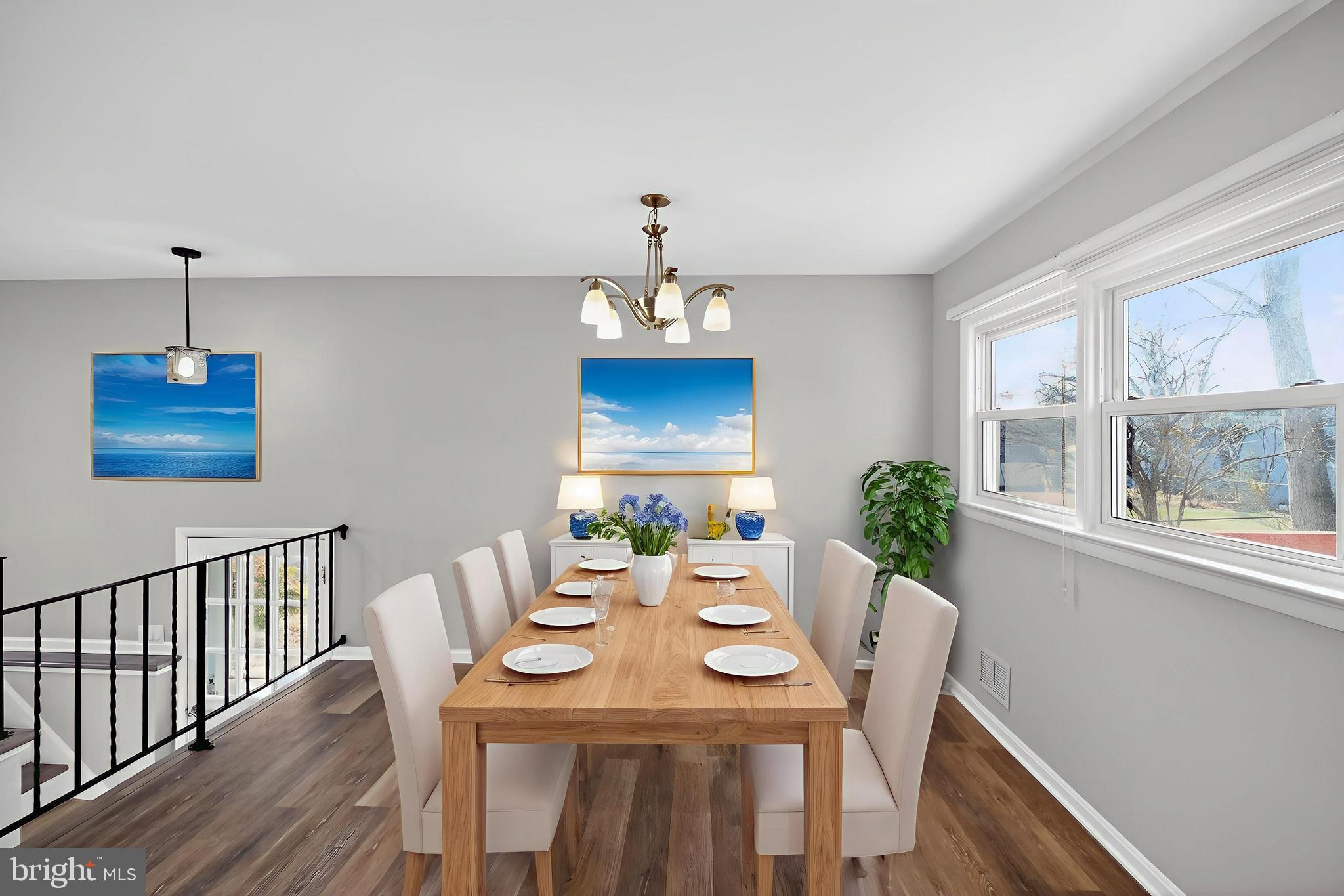 8012 Frye Road Alexandria, VA 22309 - Photo 11 of 40 a view of a dining room with furniture window and wooden floor