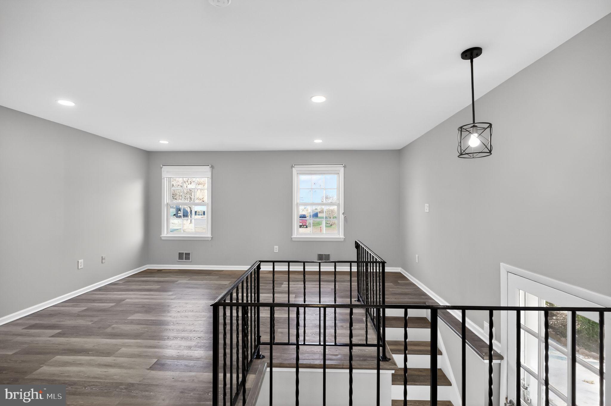 8012 Frye Road Alexandria, VA 22309 - Photo 12 of 40 a view of a bedroom with window and hardwood floor