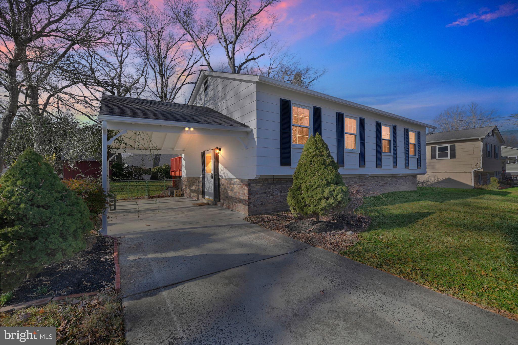 8012 Frye Road Alexandria, VA 22309 - Photo 2 of 40 a front view of a house with garden