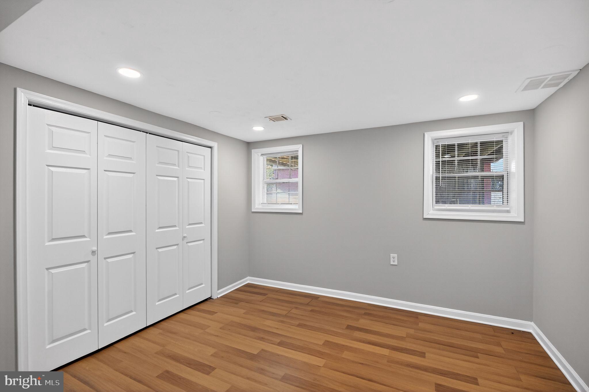 8012 Frye Road Alexandria, VA 22309 - Photo 34 of 40 a view of empty room with wooden floor