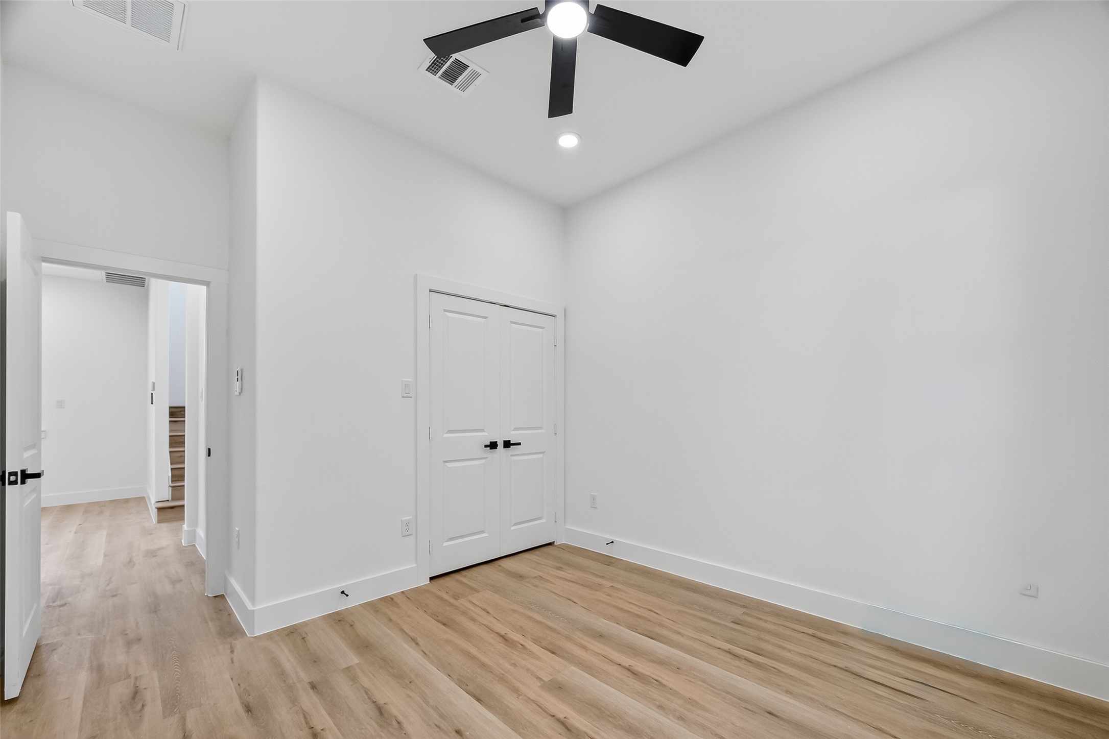 3315 Nettleton Street Houston, TX 77004 - Photo 19 of 38 a view of an empty room with wooden floor