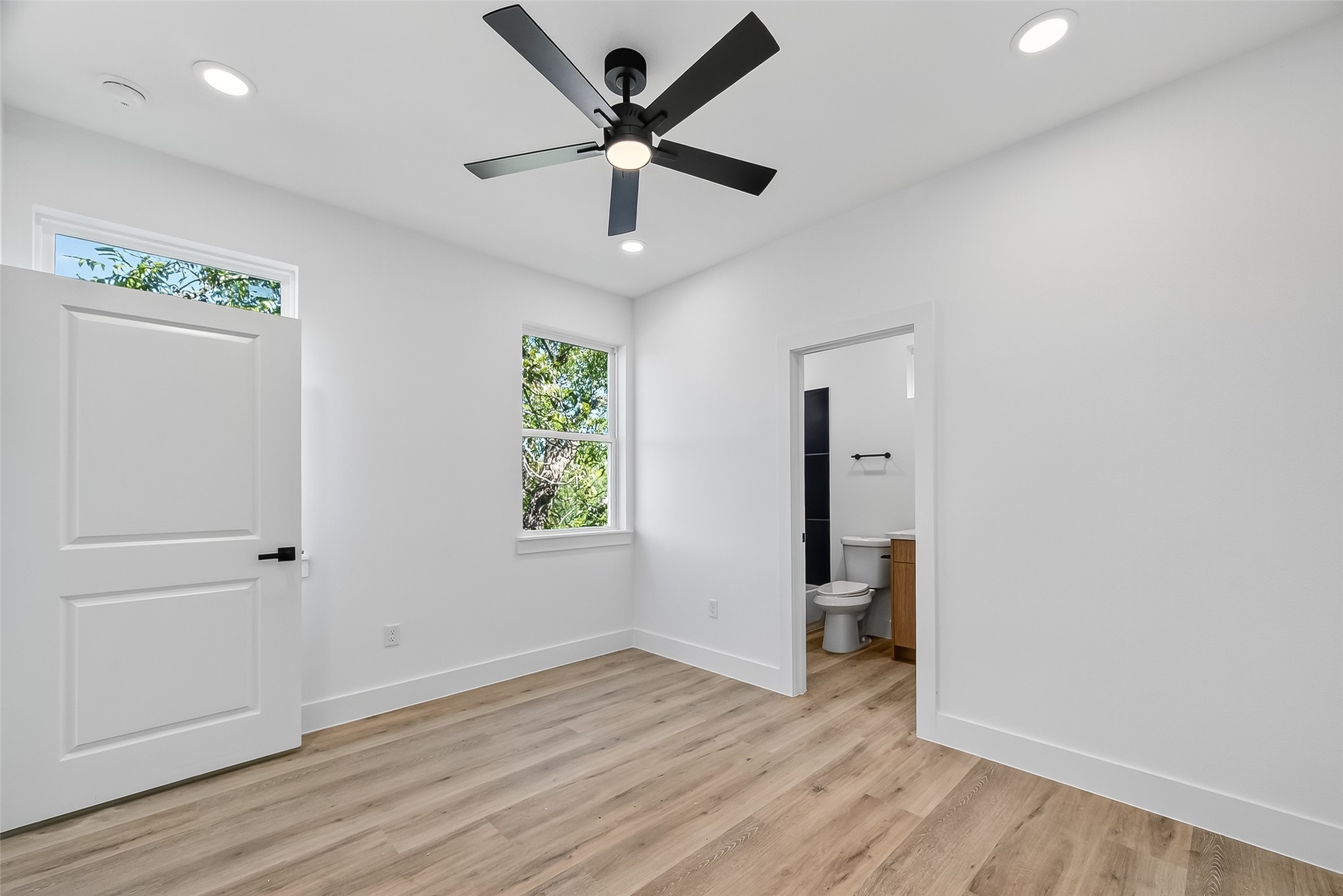 3315 Nettleton Street Houston, TX 77004 - Photo 22 of 38 wooden floor in an empty room with a window