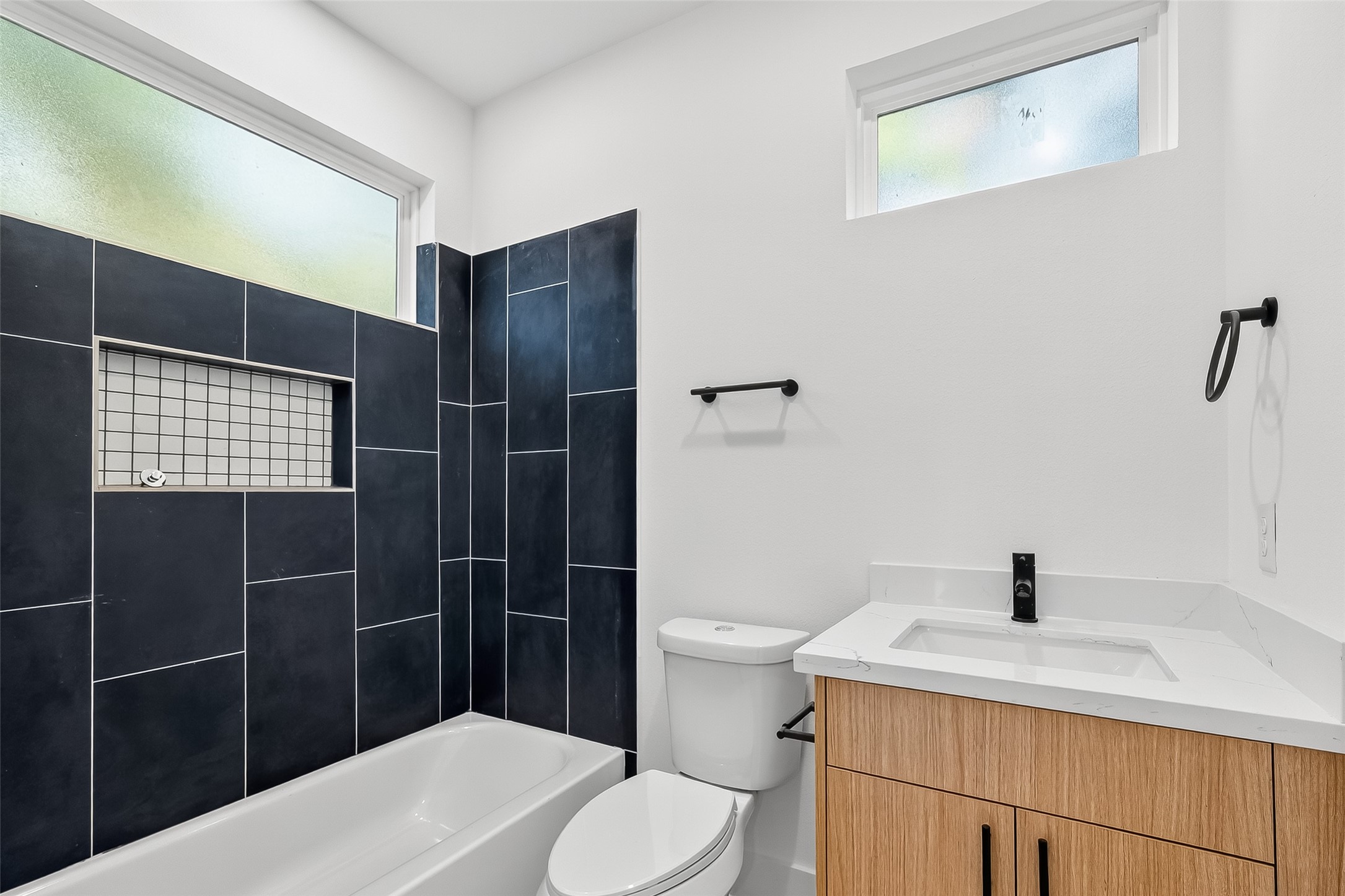 3315 Nettleton Street Houston, TX 77004 - Photo 29 of 38 a bathroom with a sink toilet and shower