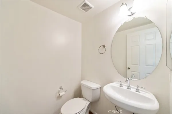 a view of a livingroom with wooden floor