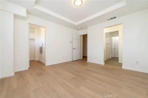 a bathroom with a sink double vanity and a mirror