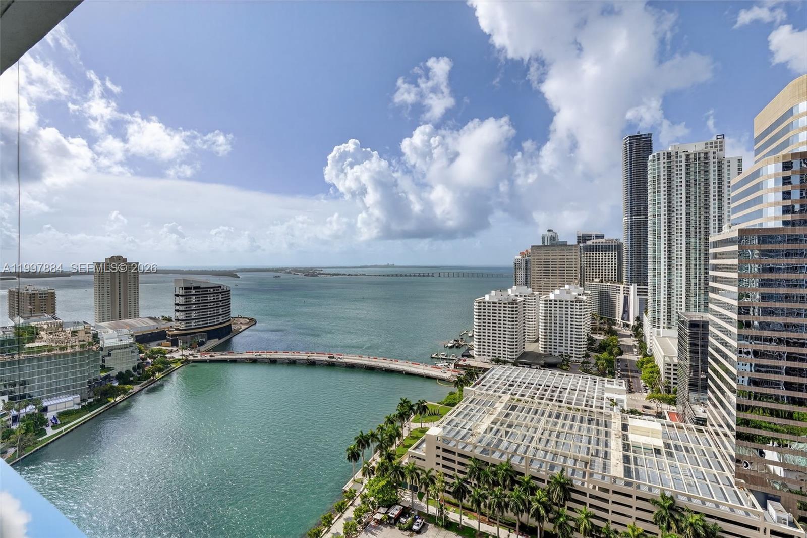 495 Brickell Avenue, Unit 2807 Miami, FL 33131 - Photo 20 of 23 a view of a lake with tall buildings