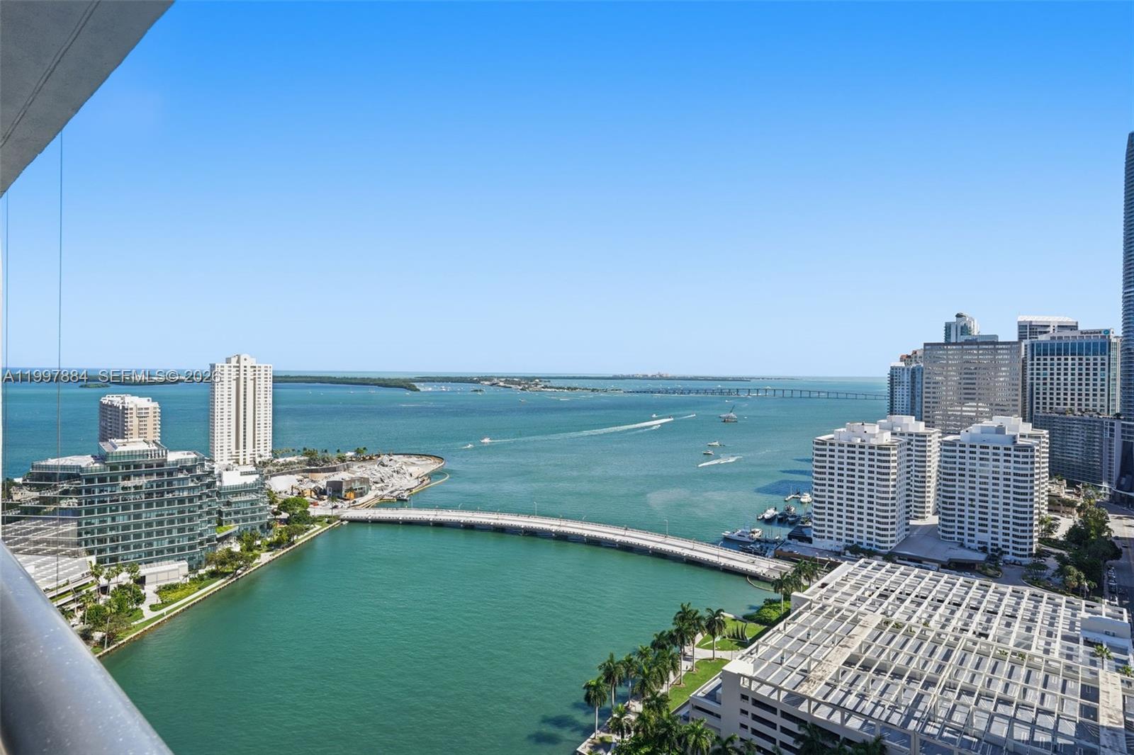 495 Brickell Avenue, Unit 2807 Miami, FL 33131 - Photo 22 of 23 a view of a balcony with an ocean