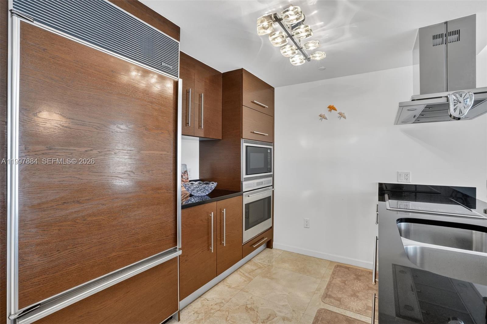 495 Brickell Avenue, Unit 2807 Miami, FL 33131 - Photo 3 of 23 a bathroom with a double vanity sink and a mirror
