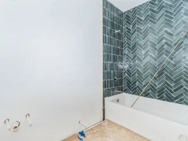 a bathroom with a bathtub