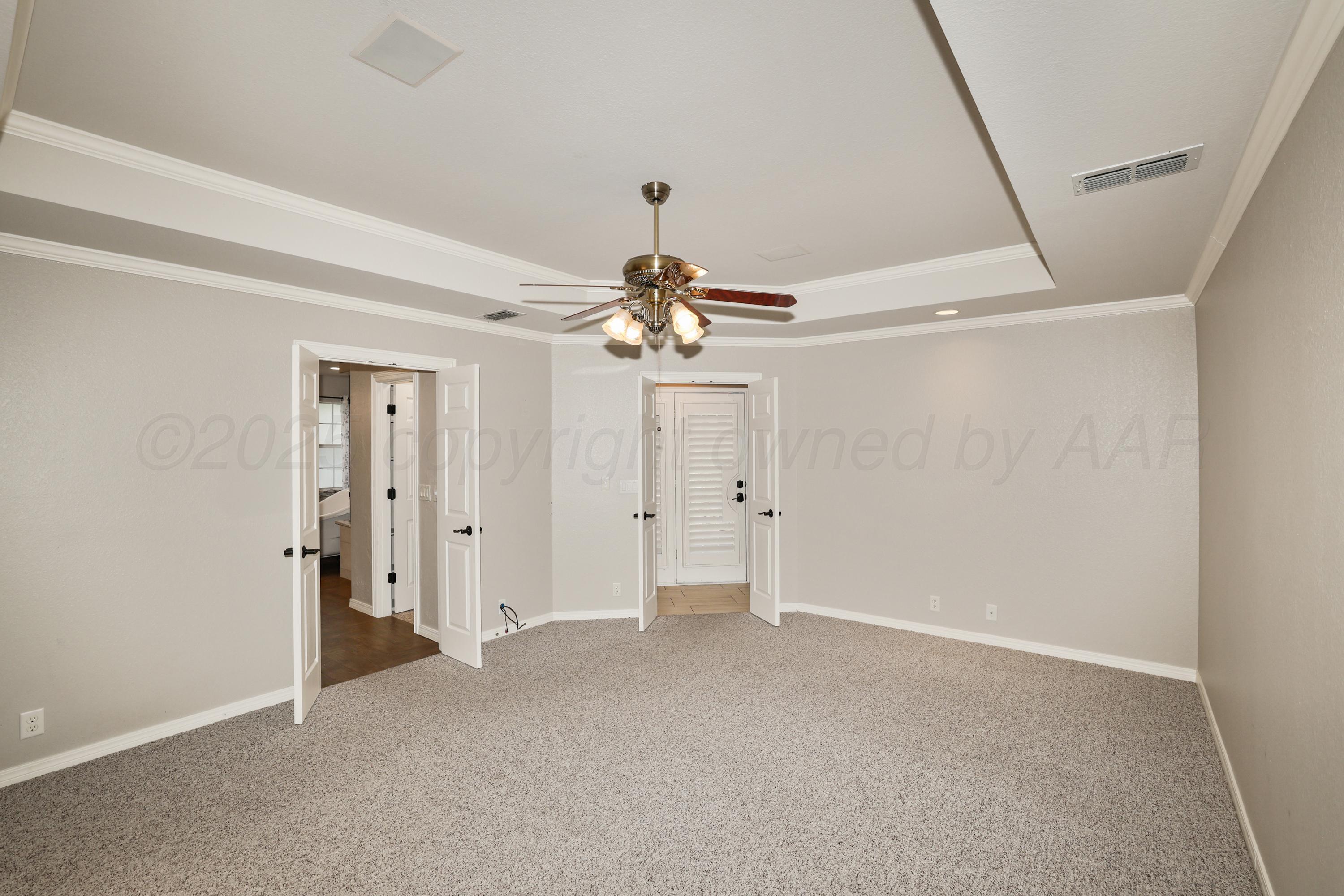 6506 Bayberry Lane Amarillo, TX 79124 - Photo 16 of 32 a very nice looking room with a ceiling fan
