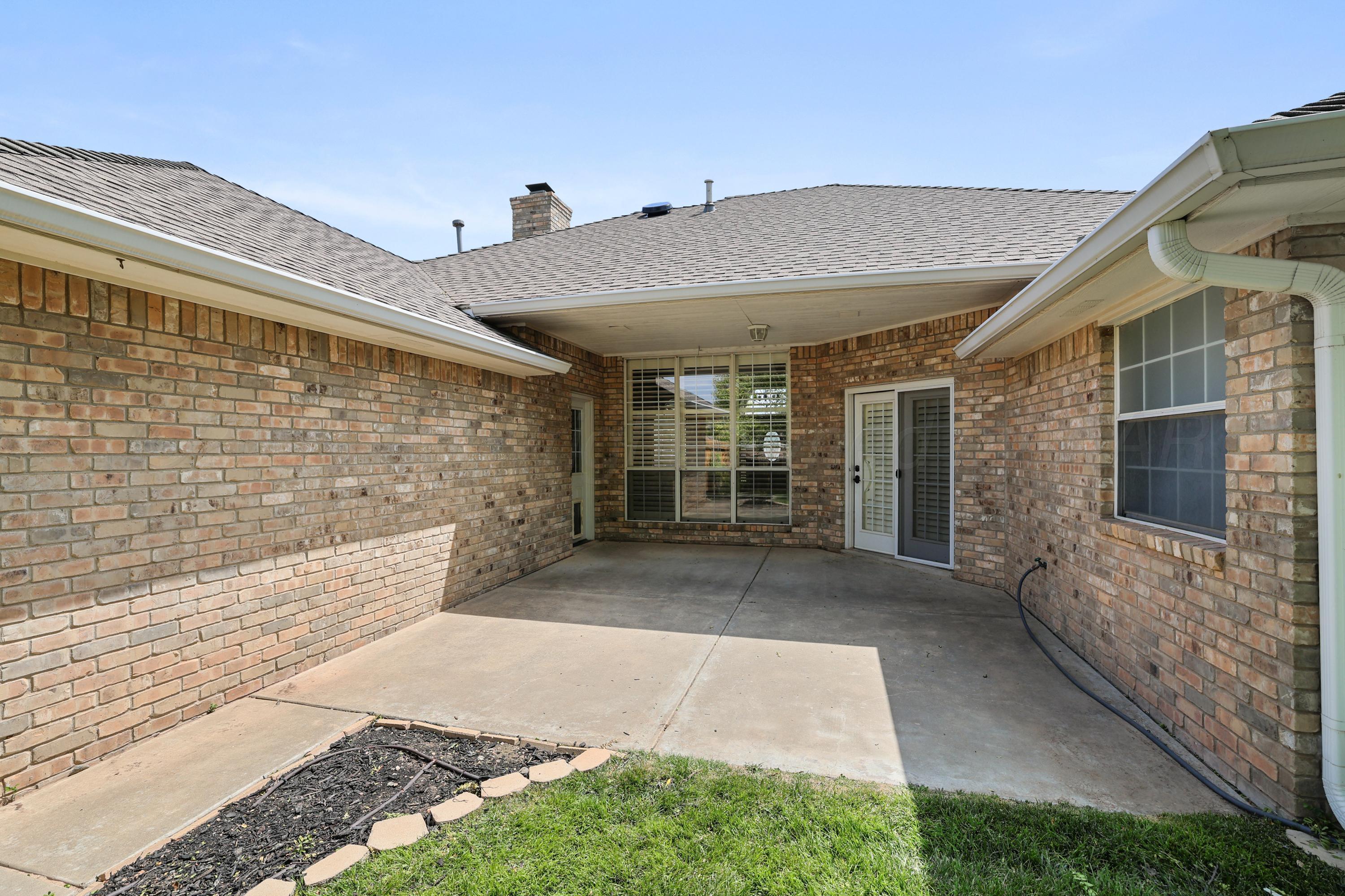 6506 Bayberry Lane Amarillo, TX 79124 - Photo 28 of 32 a view of a back yard of the house
