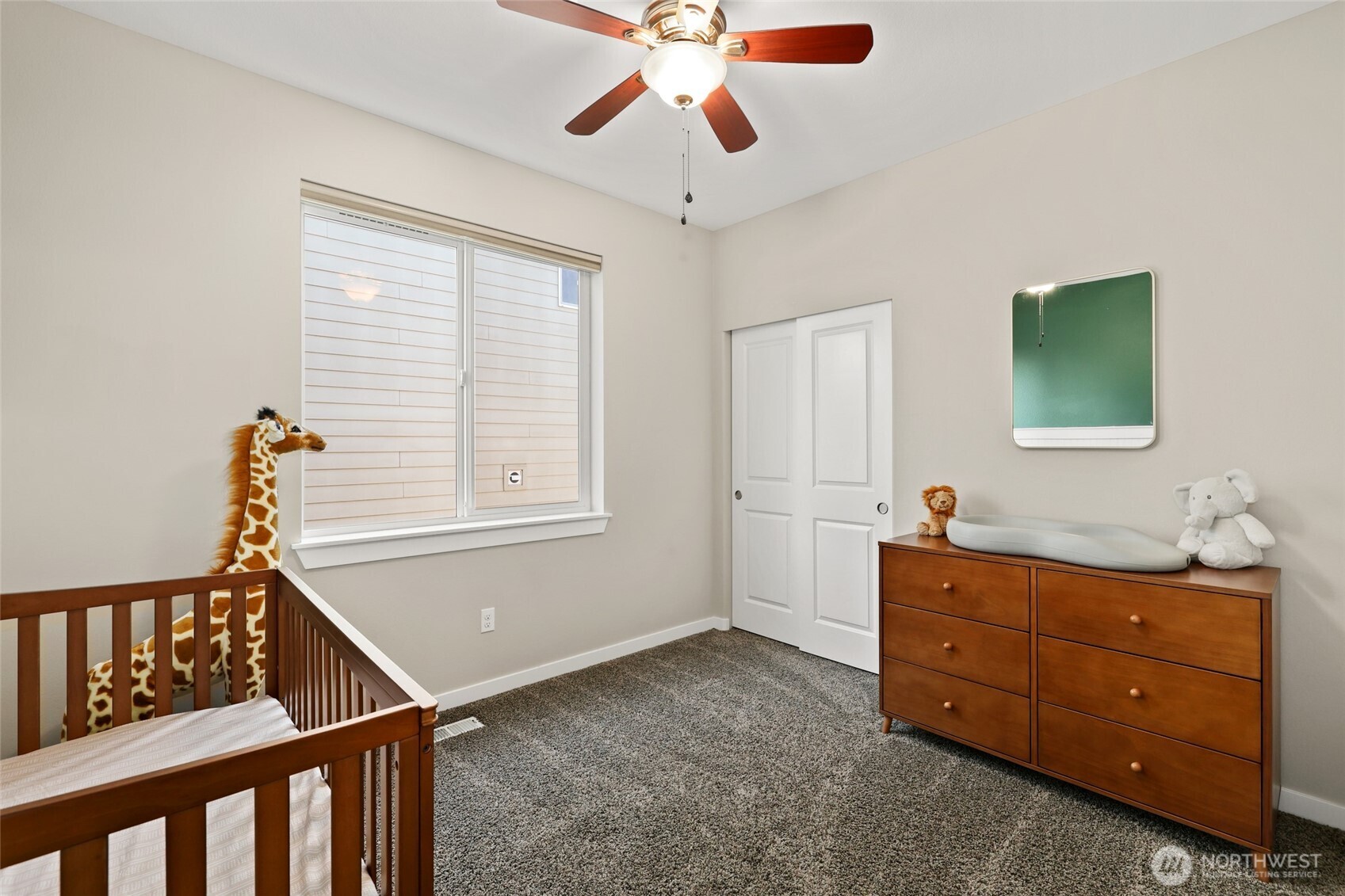 1320 34th Street Southeast Puyallup, WA 98372 - Photo 25 of 40 a room with a window and a dresser