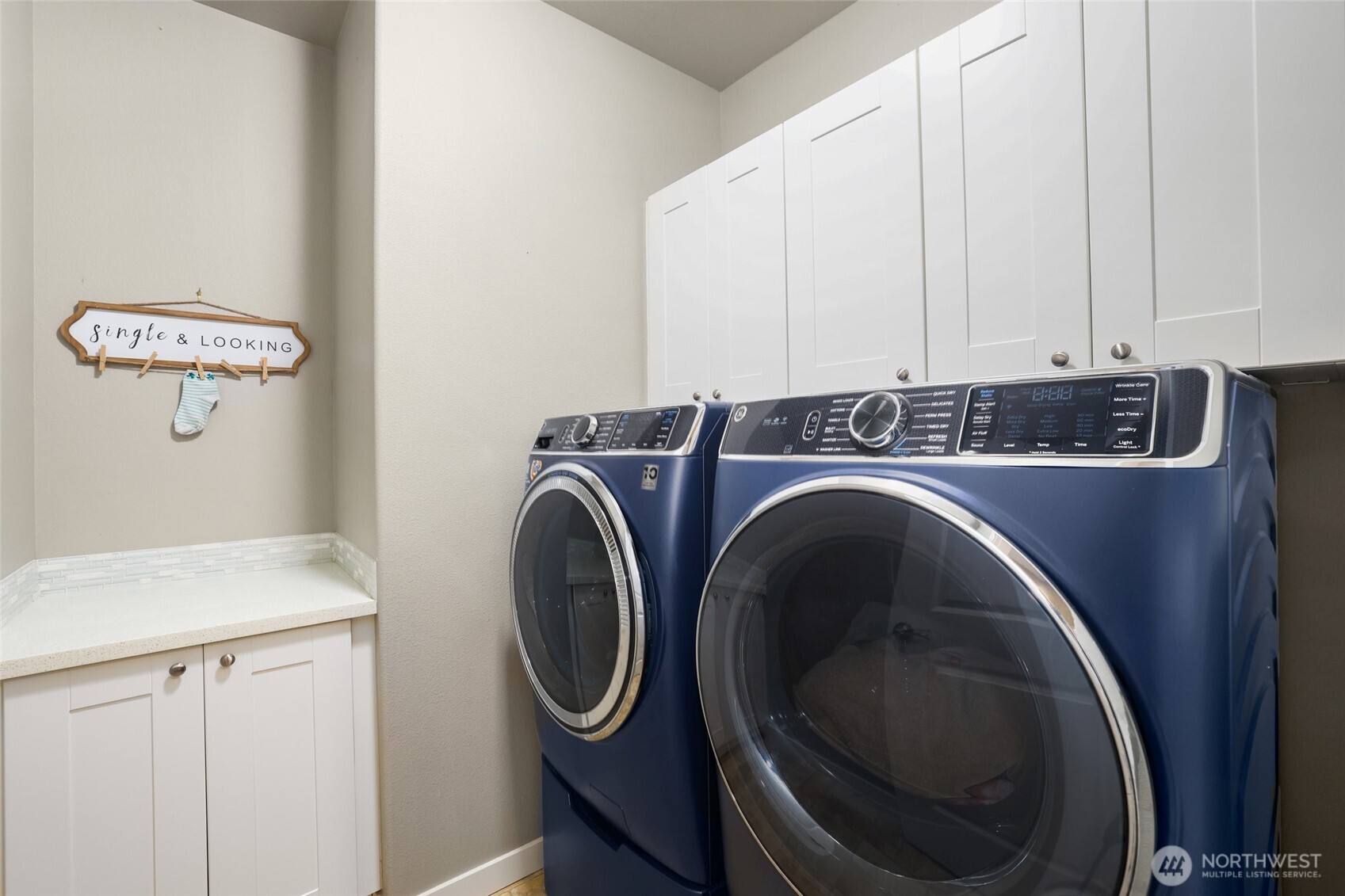 1320 34th Street Southeast Puyallup, WA 98372 - Photo 28 of 40 a utility room with dryer and washer