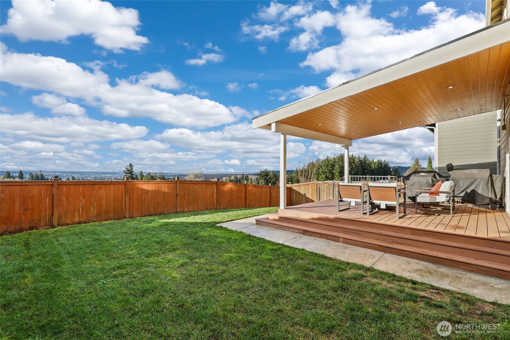 1320 34th Street Southeast Puyallup, WA 98372 - Photo 30 of 40 a view of yard with swimming pool and seating