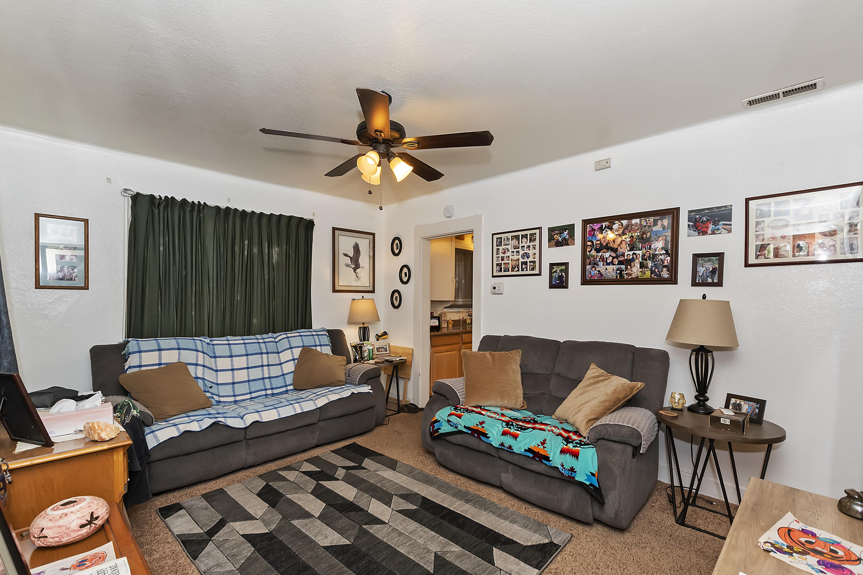 2691 Mulberry Street Riverside, CA 92501 - Photo 2 of 14 a living room with furniture and a window