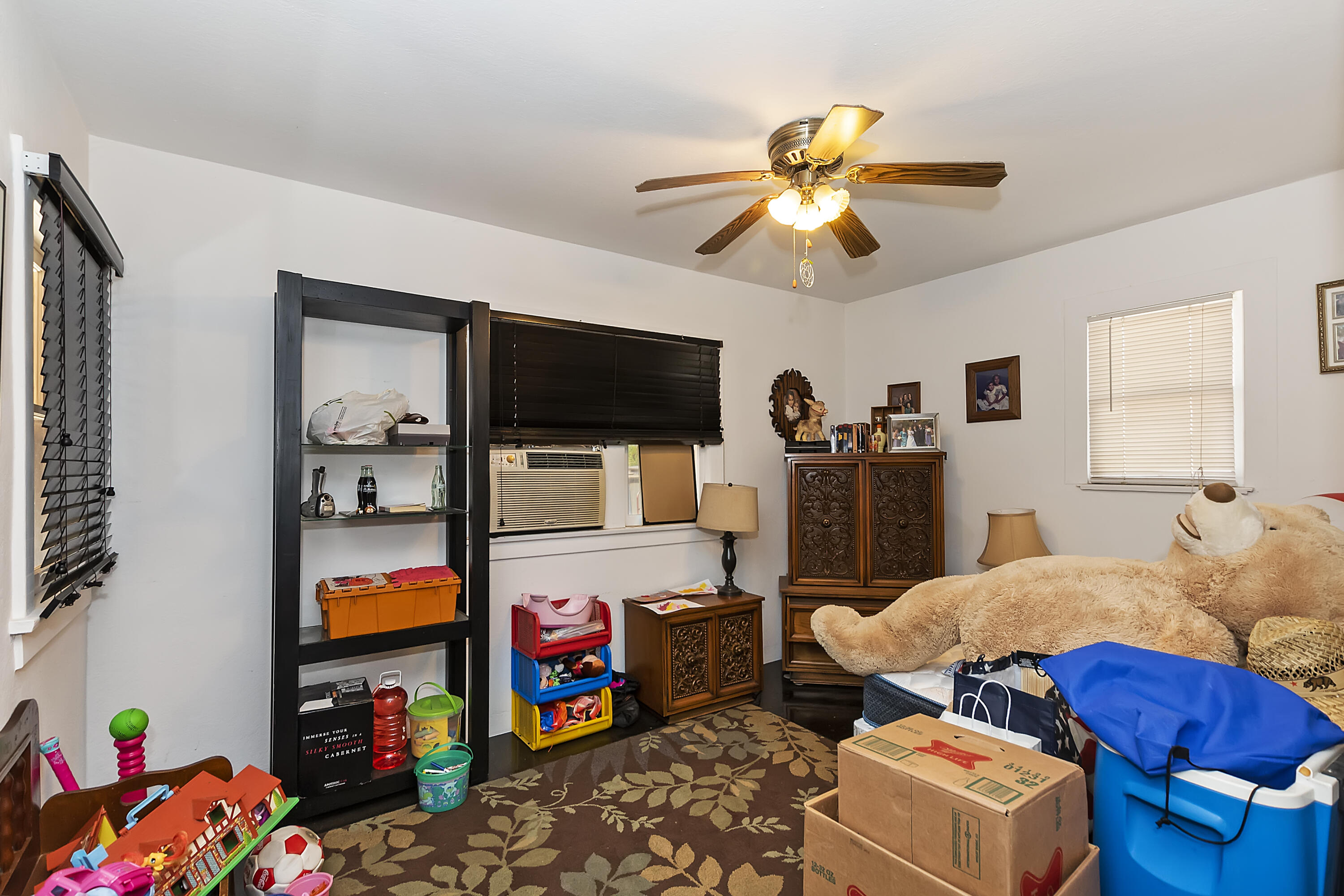 2691 Mulberry Street Riverside, CA 92501 - Photo 7 of 14 a bedroom with two beds and a flat screen tv