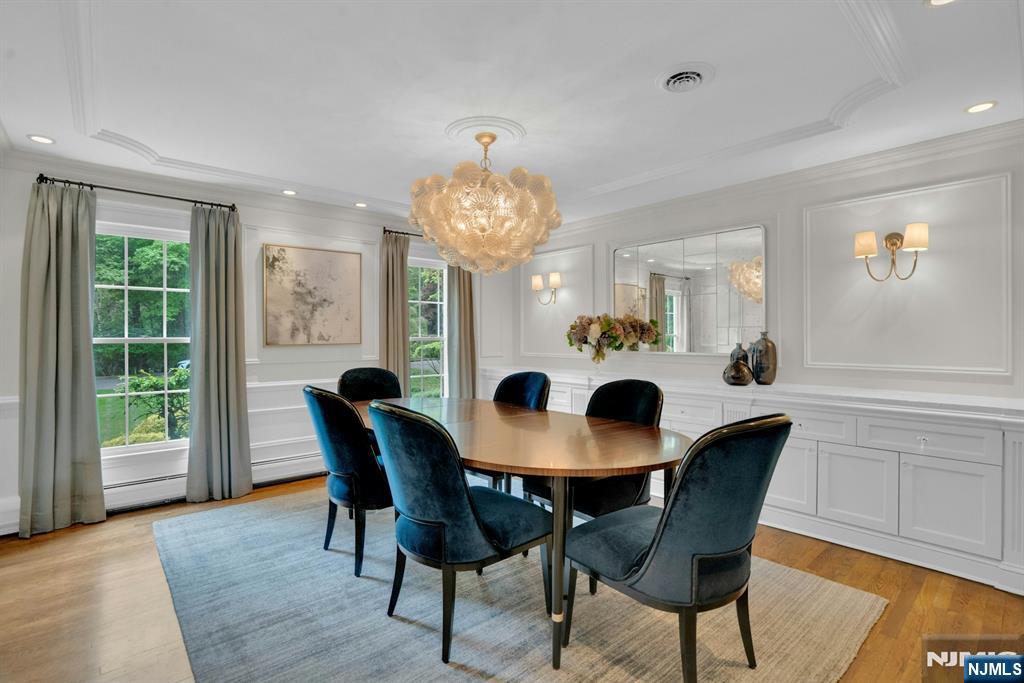 48 Hopper Farm Road Upper Saddle River, NJ 07458 - Photo 5 of 43 a dining room with furniture and window