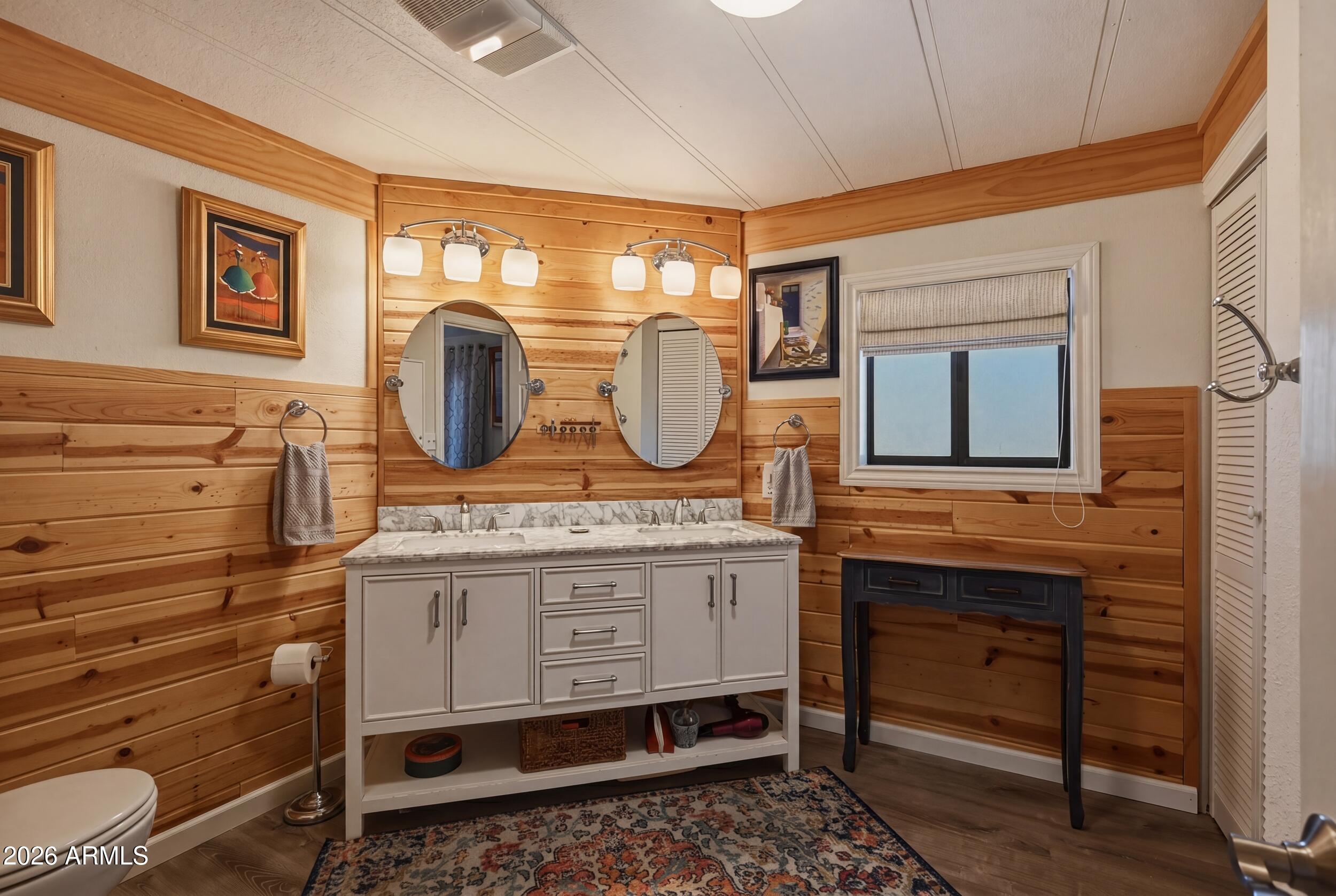1108 North William Tell Circle Payson, AZ 85541 - Photo 24 of 32 a bathroom with a sink a vanity and a mirror