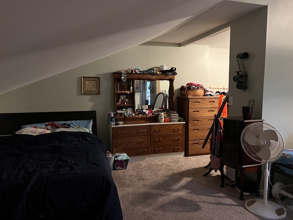 120 Main Road Colrain, MA 01340 - Photo 8 of 31 a bedroom with a bed and cabinets