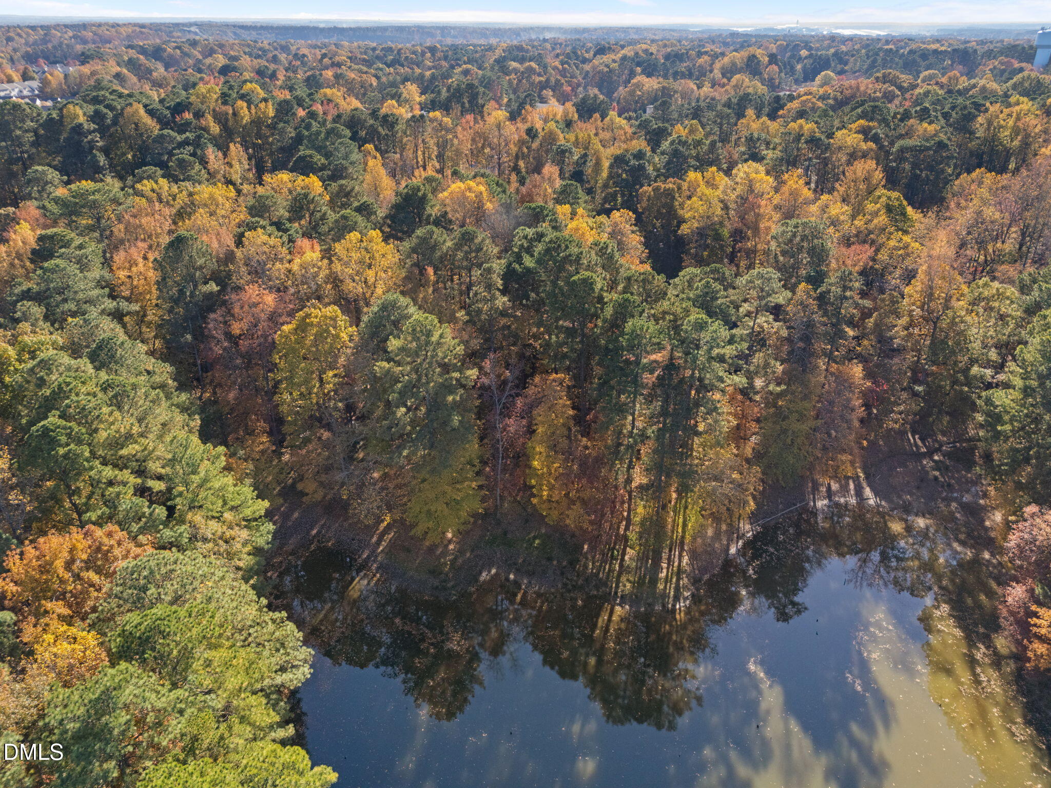 11408 Claybank Place Raleigh, NC 27613 - Photo 4 of 10 an aerial view of city and trees