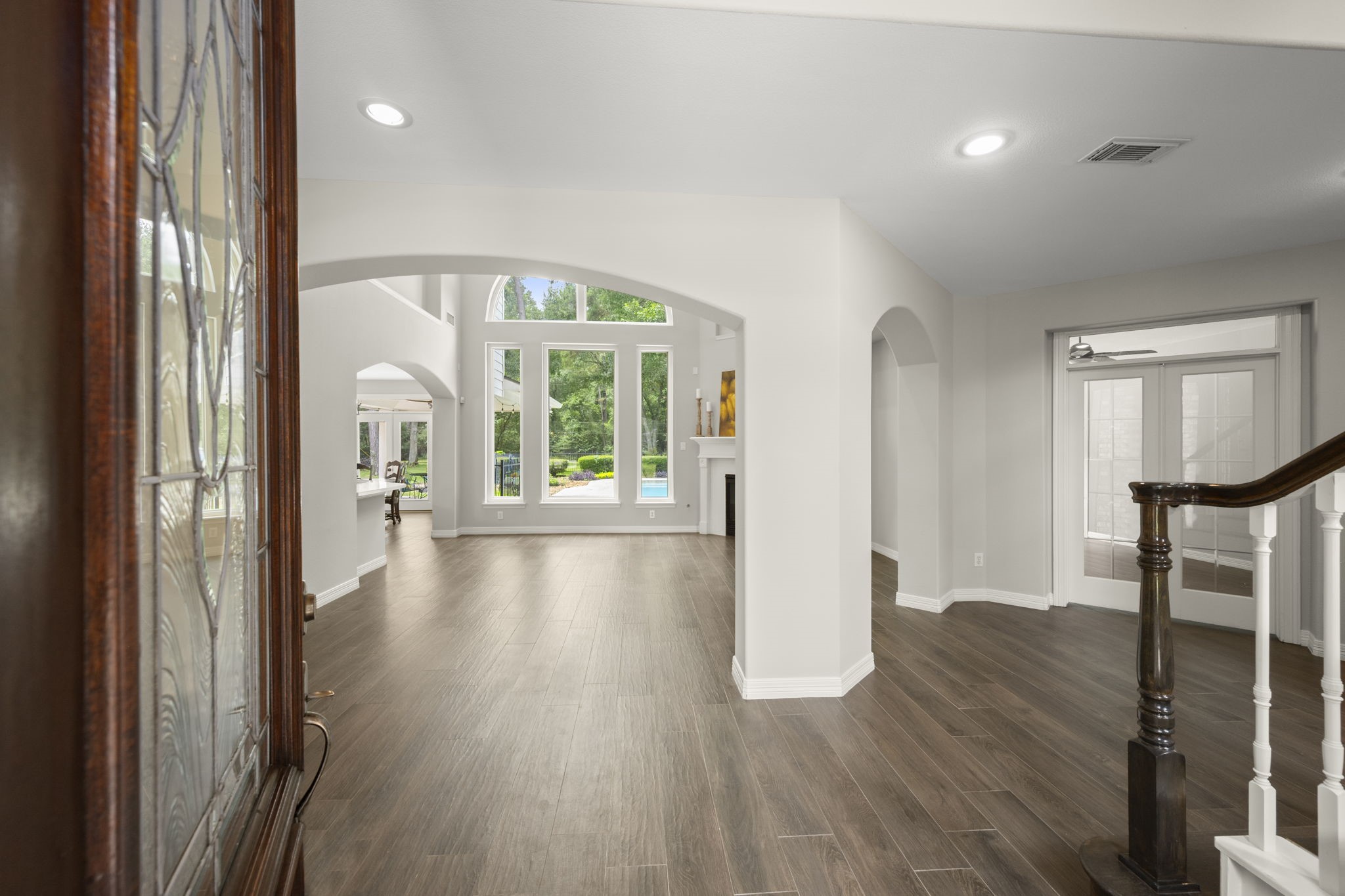 2326 Timbergreen Circle Magnolia, TX 77355 - Photo 5 of 43 a view of a hallway with wooden floor and glass door