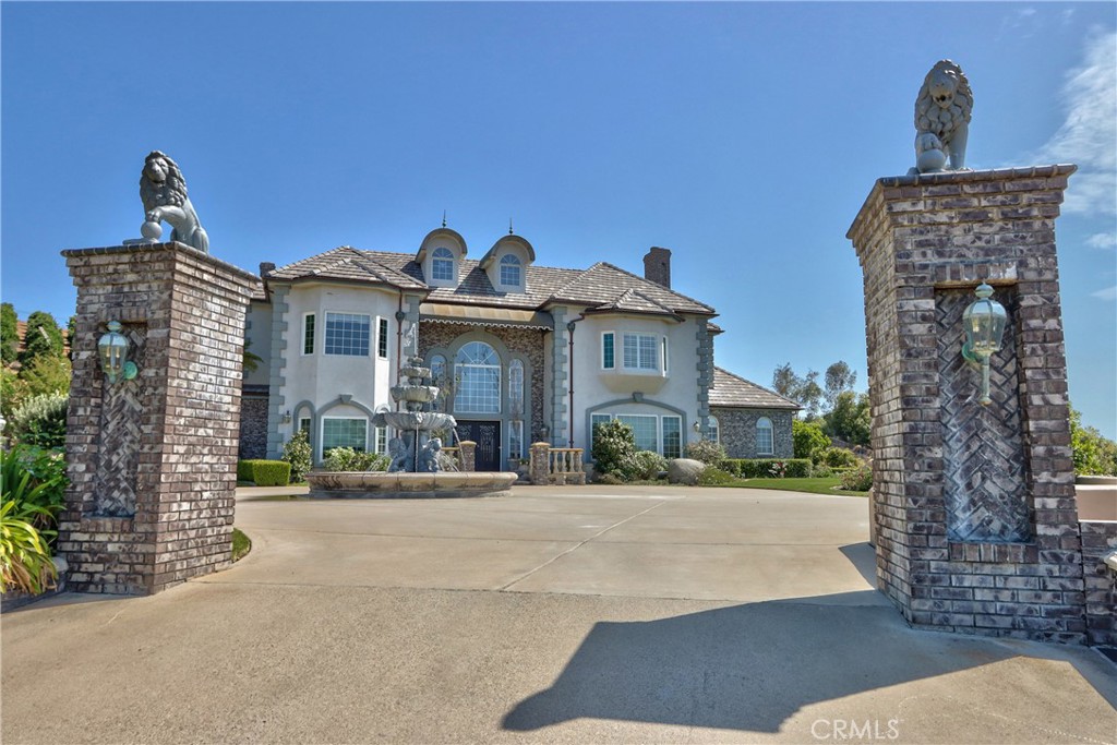 46856 El Prado Road Temecula, CA 92590 - Photo 68 of 75 a front view of a house with a garden