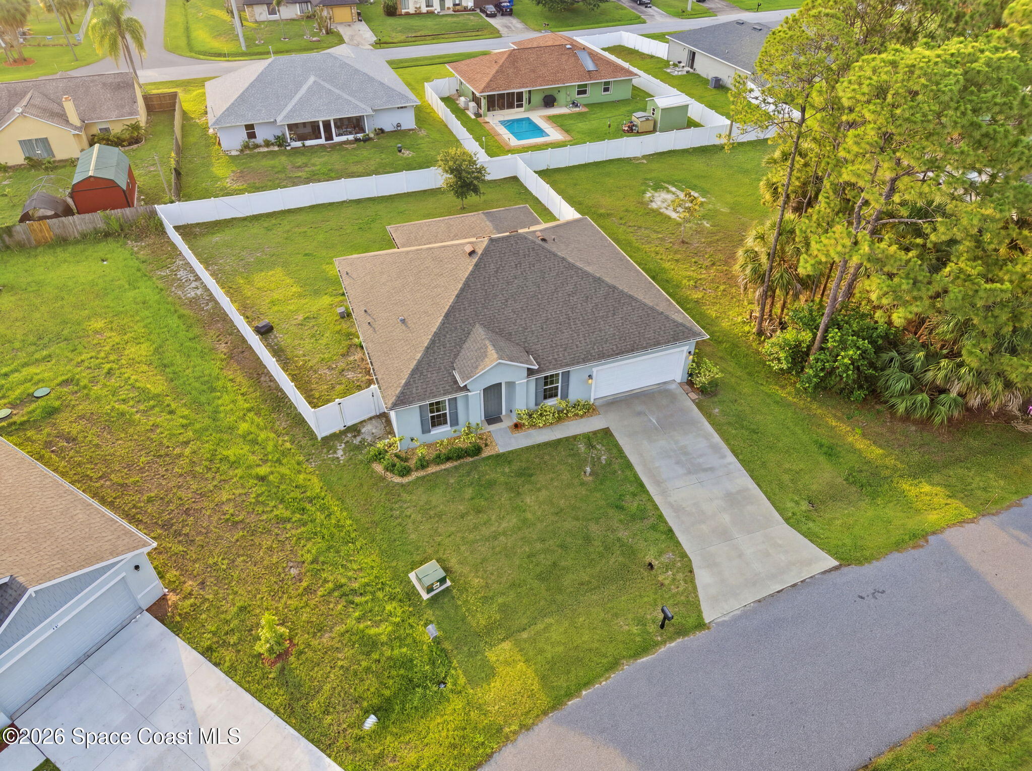 712 Duncan Road Southeast Palm Bay, FL 32909 - Photo 2 of 33 Fully Fenced Yard