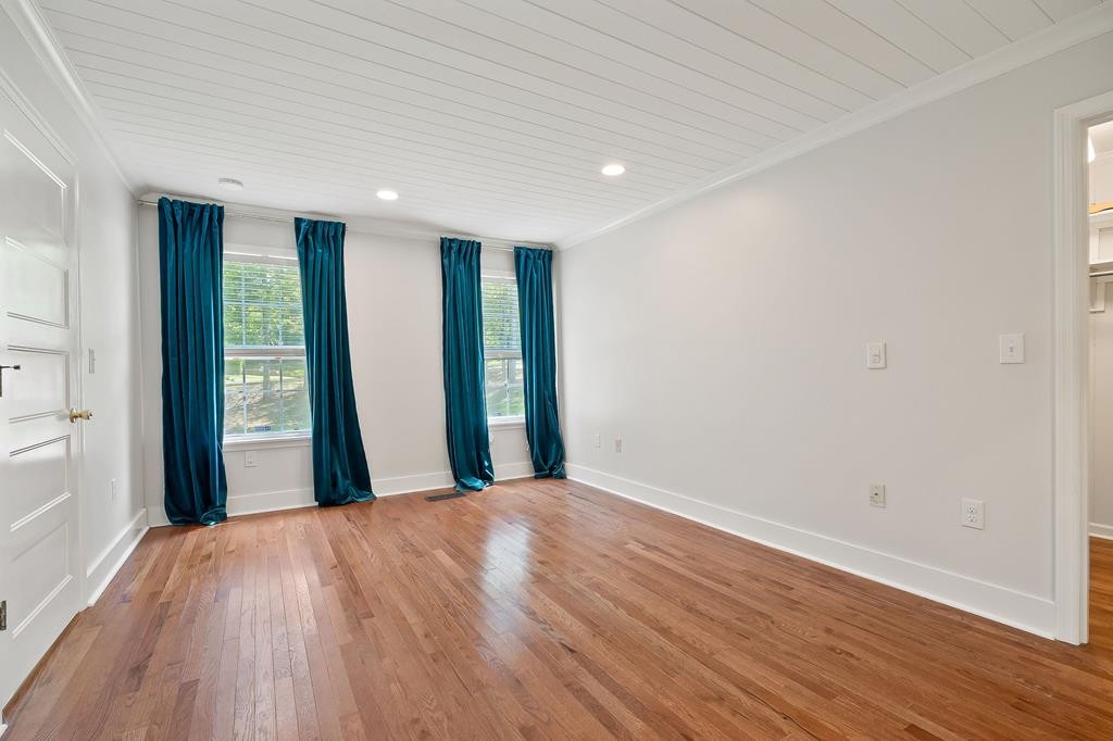 480 Jamestown Road Cookeville, TN 38501 - Photo 19 of 46 a view of a big room with wooden floor and windows