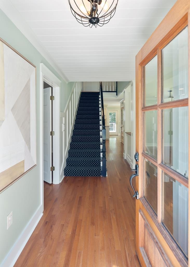 480 Jamestown Road Cookeville, TN 38501 - Photo 2 of 46 a view of a hallway with wooden floor and staircase