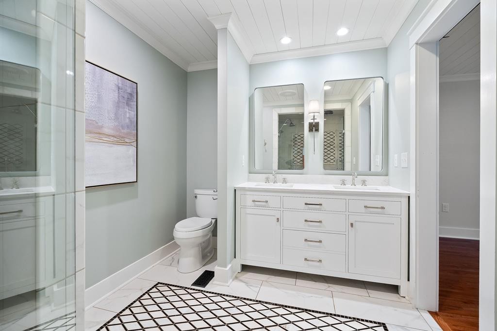 480 Jamestown Road Cookeville, TN 38501 - Photo 22 of 46 a bathroom with a sink a toilet a mirror and shower