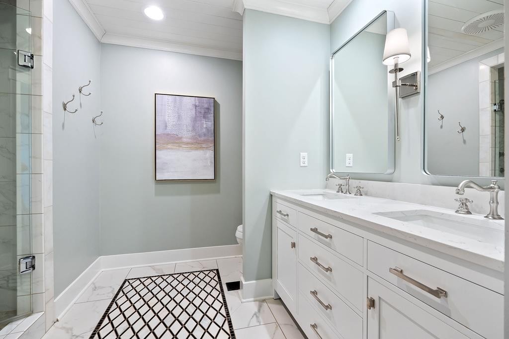 480 Jamestown Road Cookeville, TN 38501 - Photo 24 of 46 a bathroom with a double vanity sink and a mirror