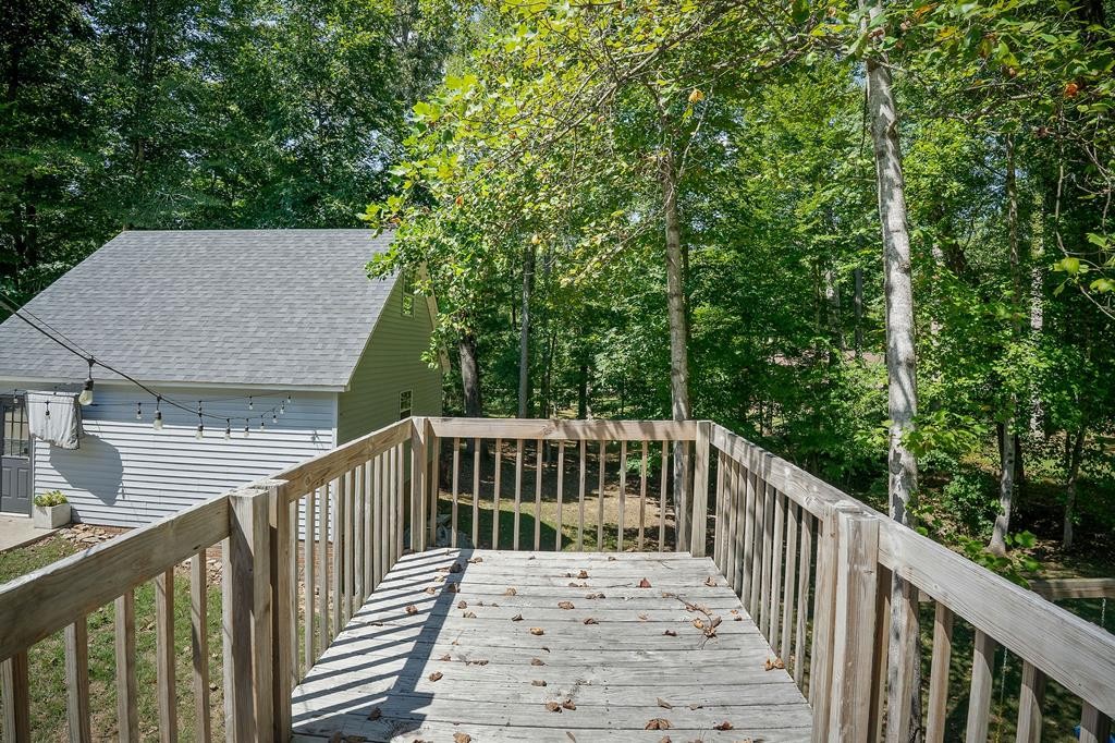 480 Jamestown Road Cookeville, TN 38501 - Photo 42 of 46 a view of a wooden deck and a yard with wooden fence