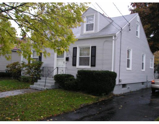44 Eloise Street Springfield, MA 01118 - Photo 1 of 5 a view of a house with a back yard
