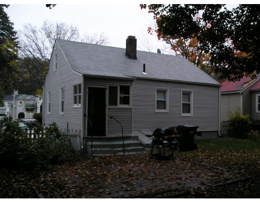 44 Eloise Street Springfield, MA 01118 - Photo 4 of 5 a house that has a lot of windows in it