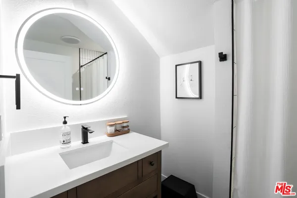 a bathroom with a toilet and a bathtub