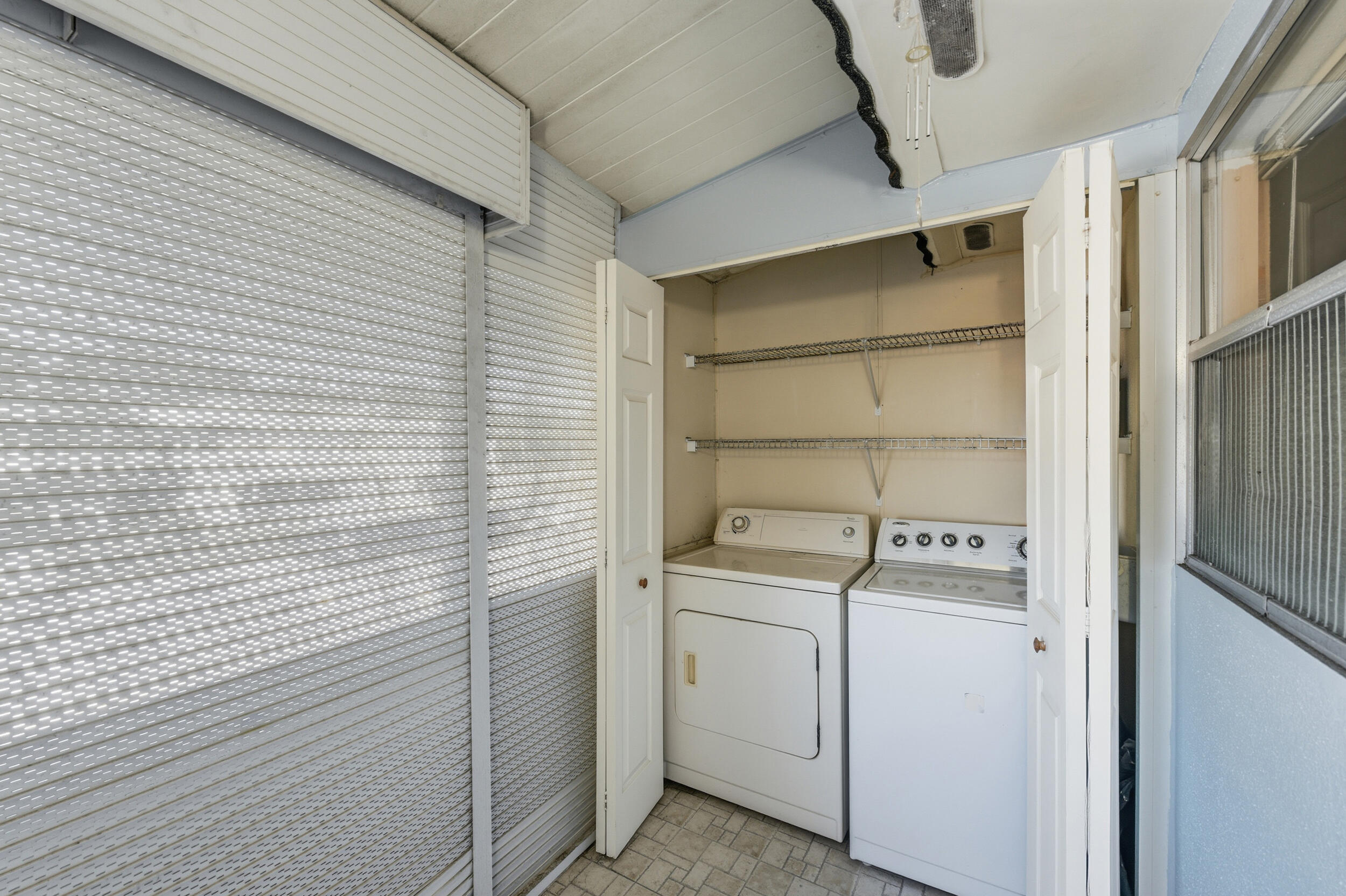 669 Saxony Place Delray Beach, FL 33446 - Photo 15 of 34 a utility room with dryer and washer