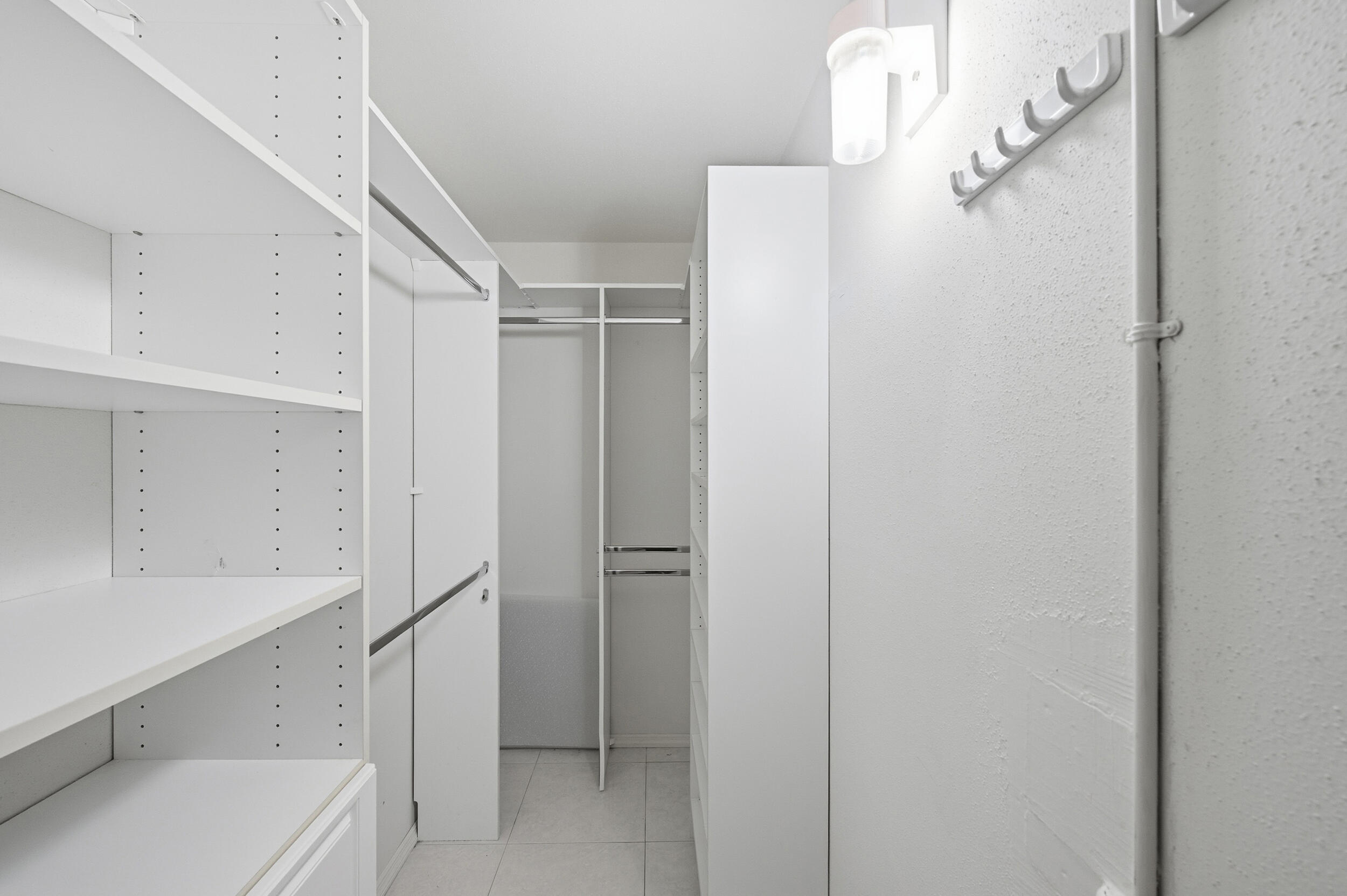 669 Saxony Place Delray Beach, FL 33446 - Photo 21 of 34 a bathroom with a shower and a sink