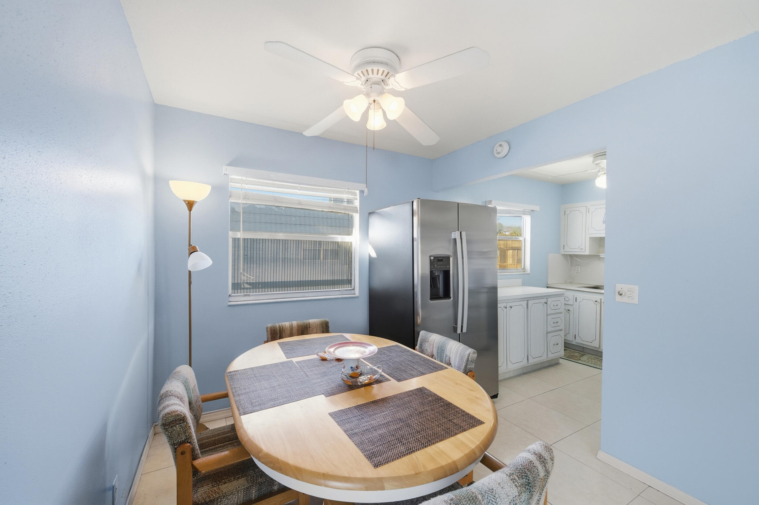 669 Saxony Place Delray Beach, FL 33446 - Photo 31 of 34 a bathroom with a sink and a mirror