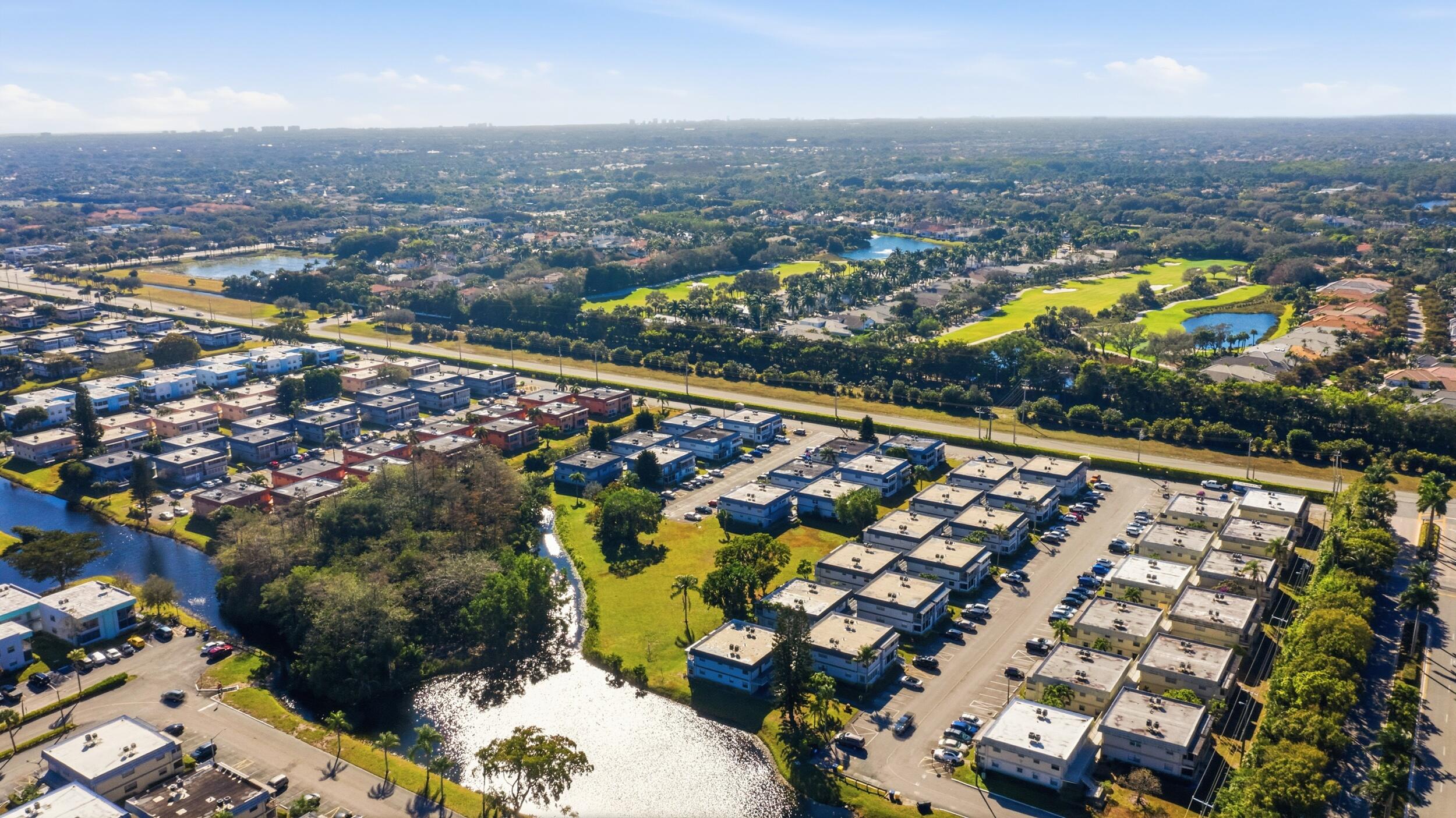 669 Saxony Place Delray Beach, FL 33446 - Photo 6 of 34 an aerial view of residential houses with outdoor space