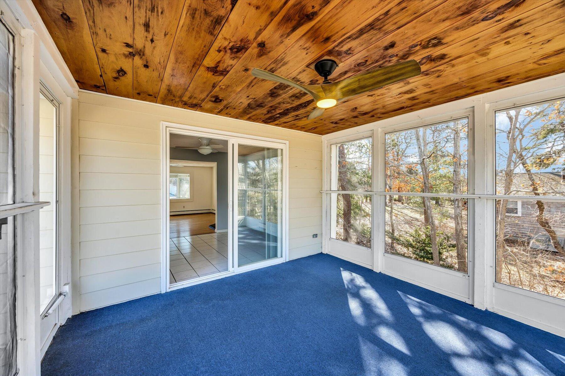 27 Madeline Road East Falmouth, MA 02536 - Photo 18 of 43 wooden floor in an empty room with a window