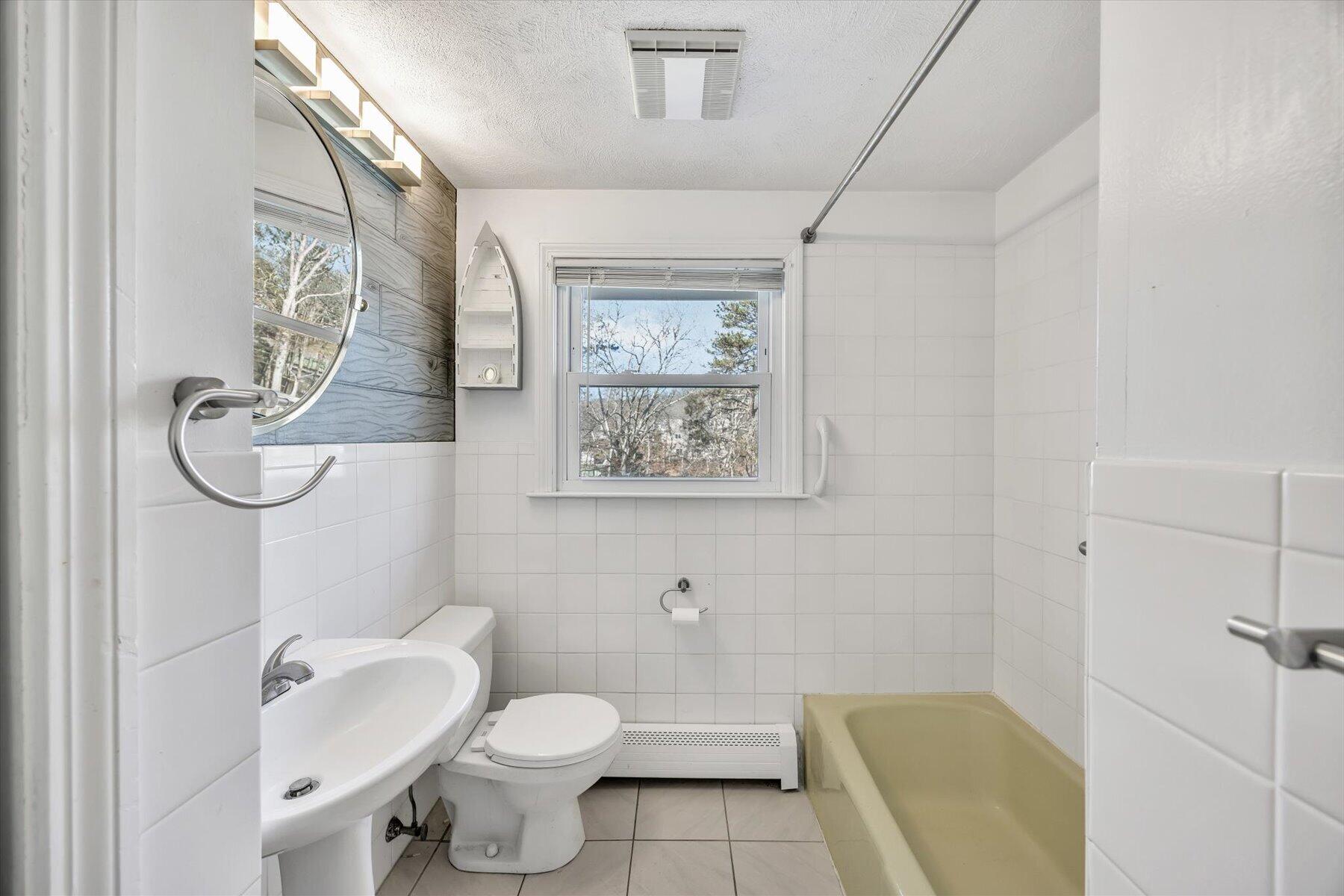 27 Madeline Road East Falmouth, MA 02536 - Photo 20 of 43 a bathroom with a toilet and a sink