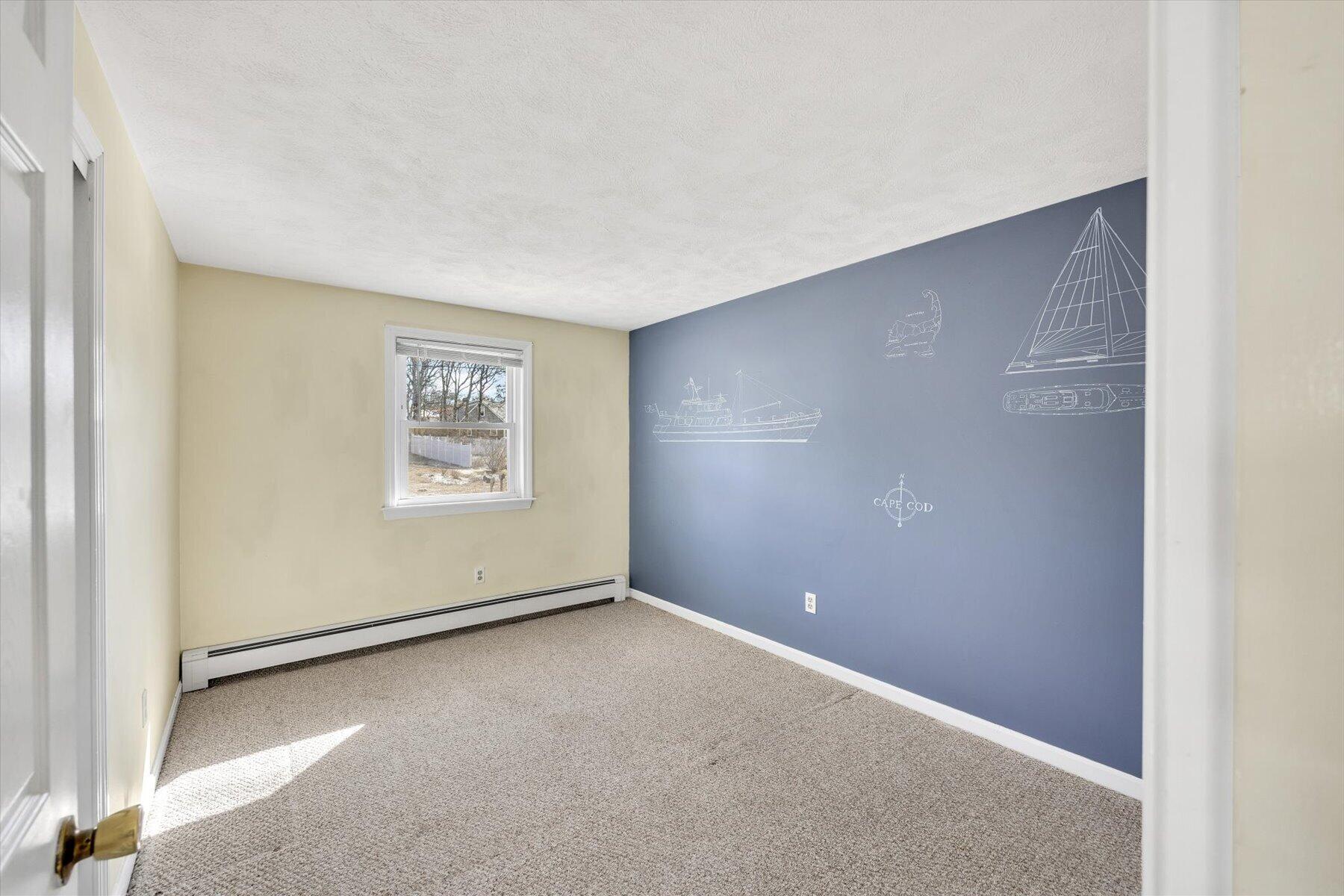 27 Madeline Road East Falmouth, MA 02536 - Photo 23 of 43 an empty room with windows
