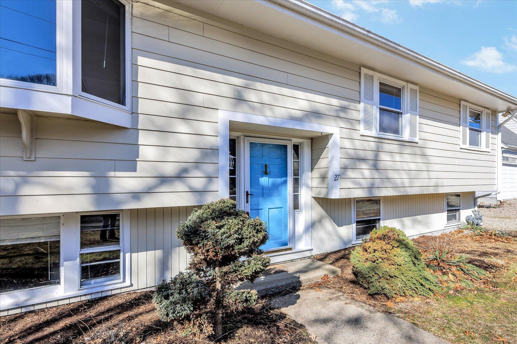 27 Madeline Road East Falmouth, MA 02536 - Photo 3 of 43 a front view of a house with a yard
