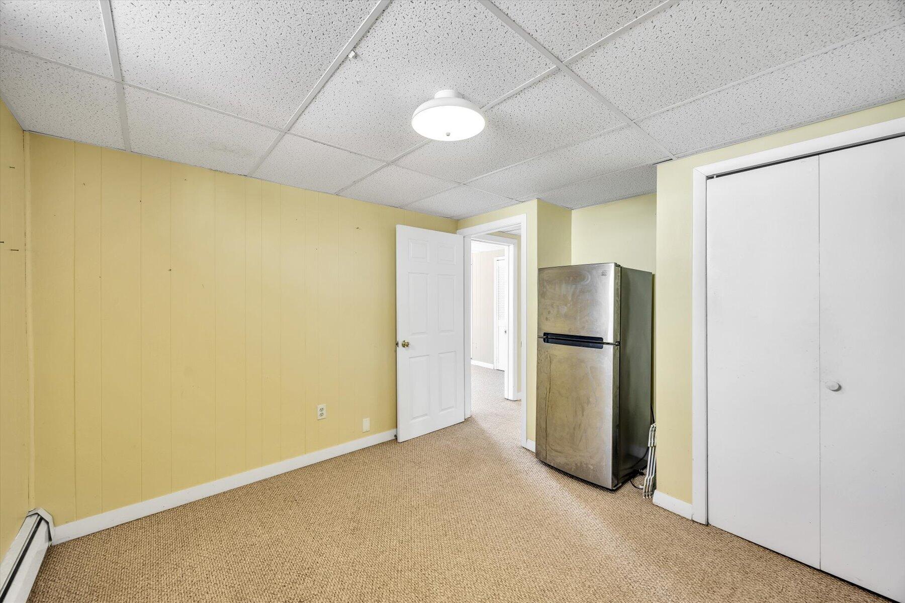 27 Madeline Road East Falmouth, MA 02536 - Photo 33 of 43 a view of an empty room with a kitchen