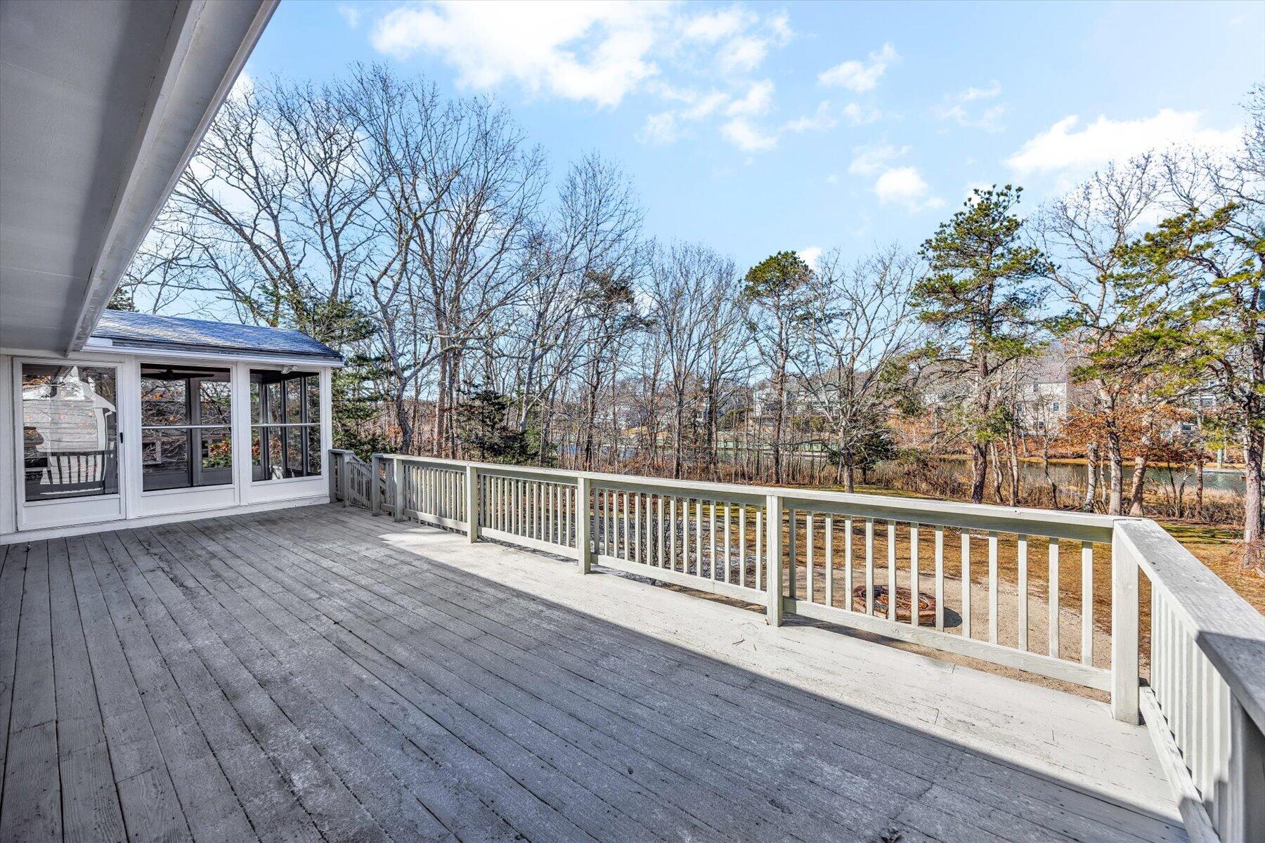 27 Madeline Road East Falmouth, MA 02536 - Photo 36 of 43 a view of a house with a roof deck