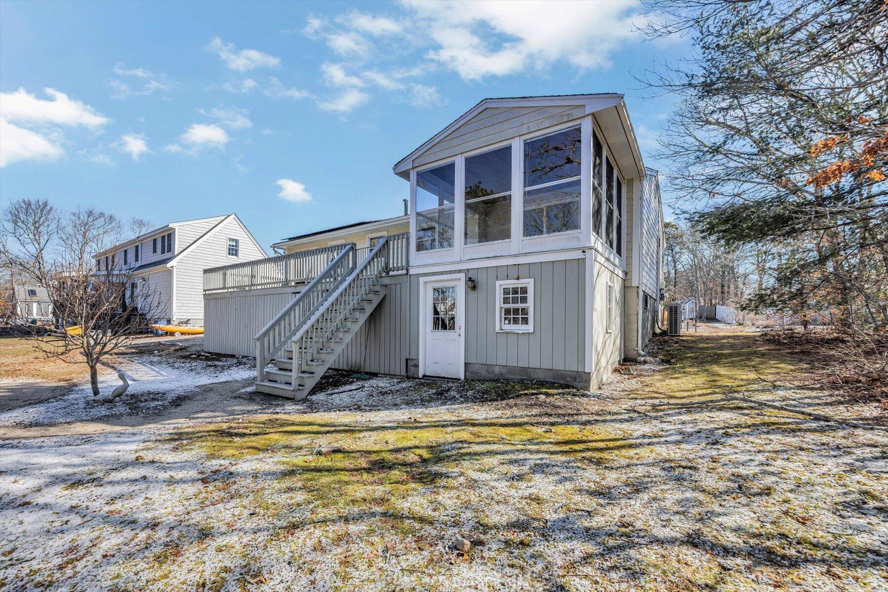 27 Madeline Road East Falmouth, MA 02536 - Photo 38 of 43 a view of a house with a yard