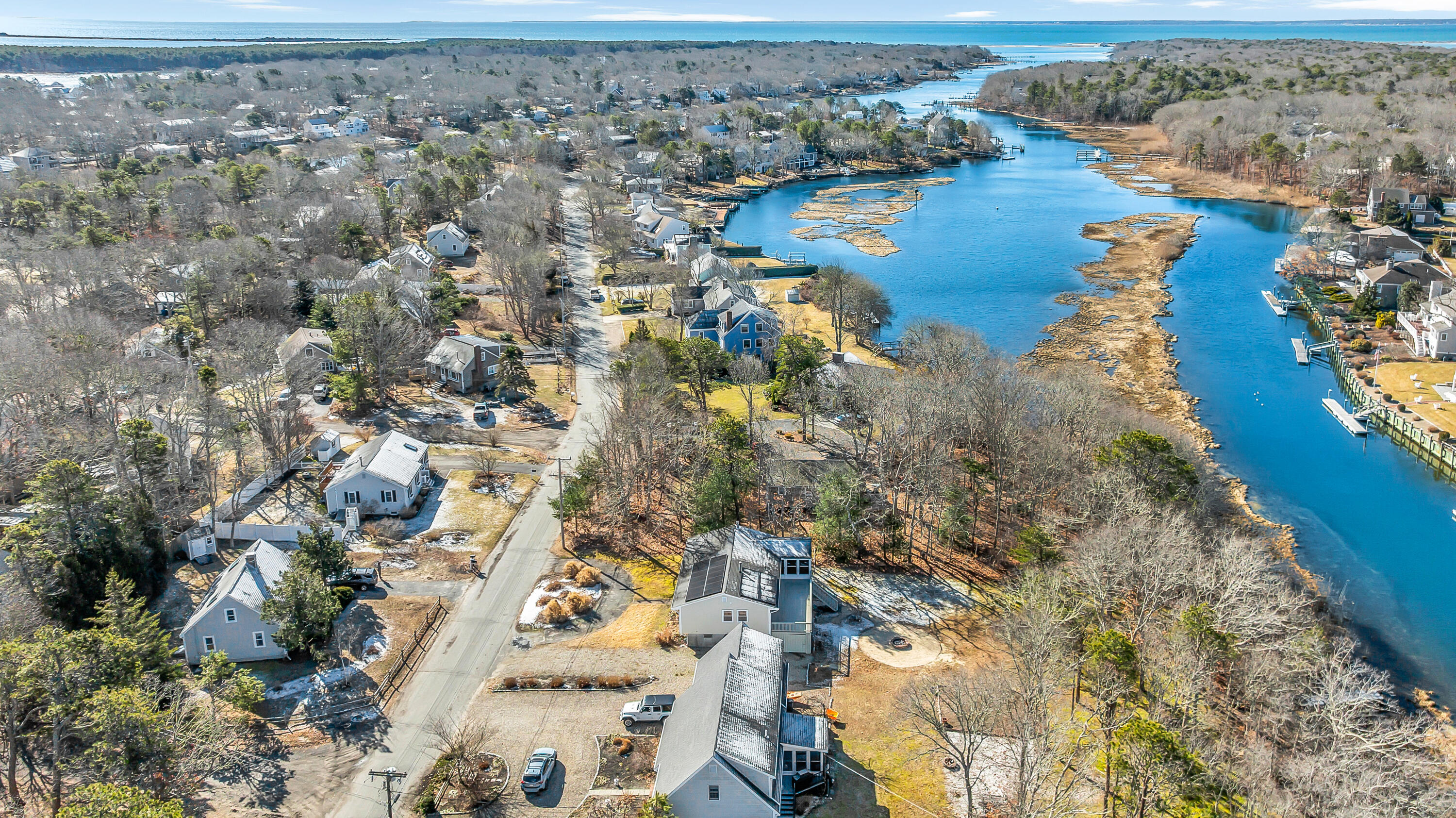 27 Madeline Road East Falmouth, MA 02536 - Photo 4 of 43 an aerial view of house with yard and lake view